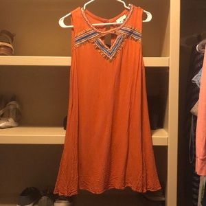 Rust colored, sheer, sheath dress